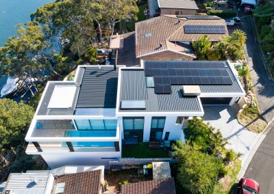 View of roof of waterfront home build by Brock build, Sutherland Shire