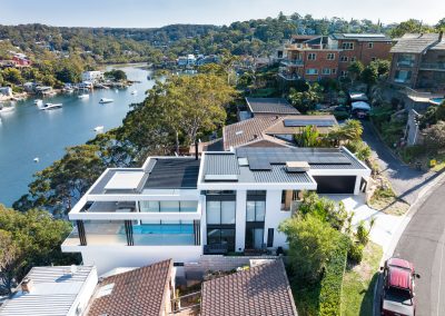 View of roof and side of waterfront home build by Brock build, Sutherland Shire