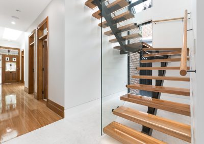 custom designed wooden and glass staircase