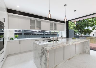Modern kitchen with marble island.